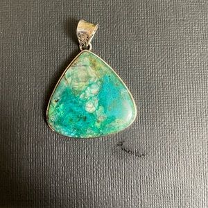 Turquoise and silver pendant